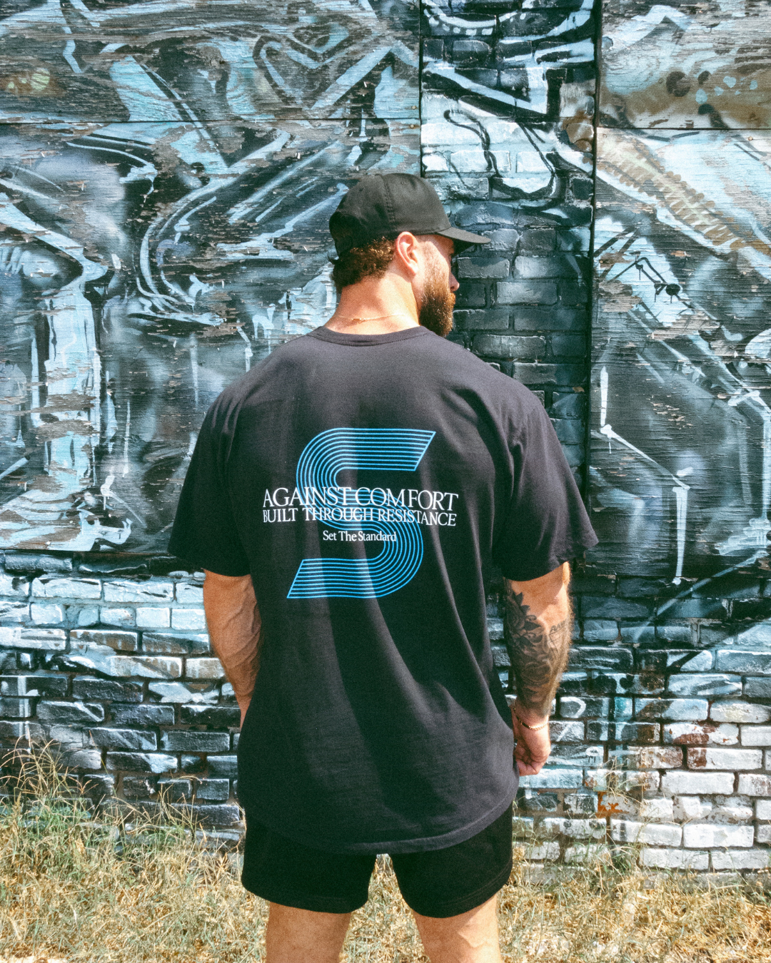 AGAINST COMFORT TEE